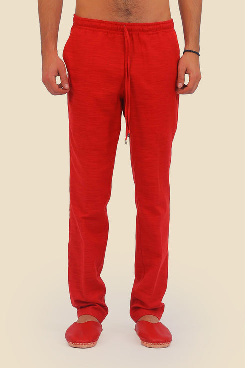 Straight leg cotton pants with elastic waistline and pockets